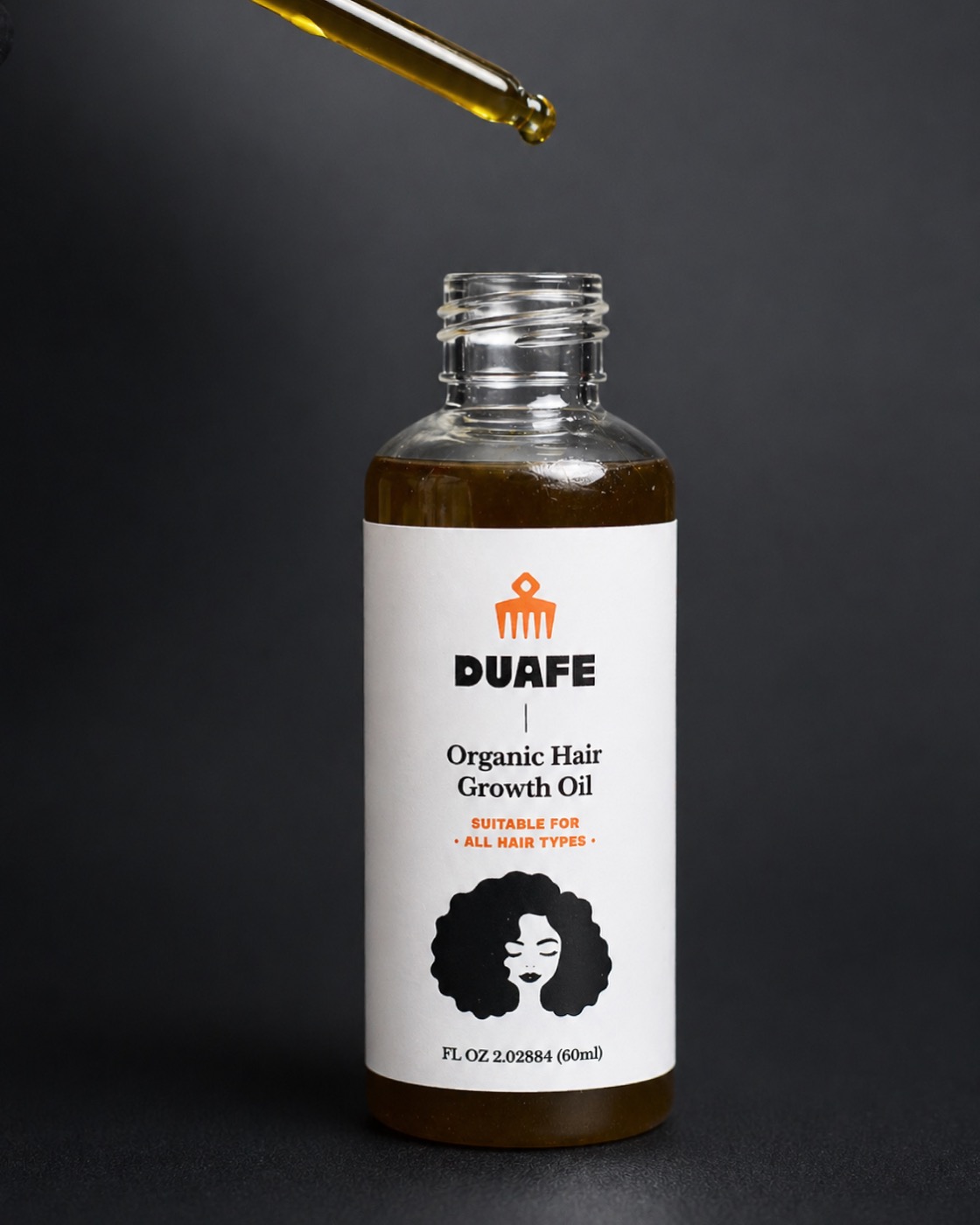 60ml glass bottle of DUAFE Hair Growth Oil with a dropper